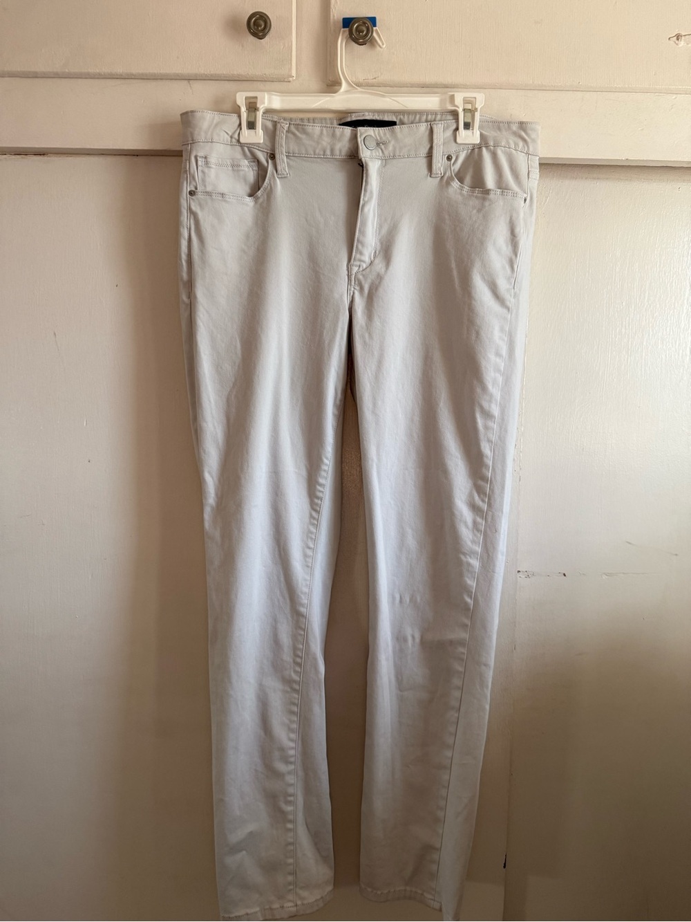 Calvin Klein stretch Jeans light gray denim with leather logo patch.